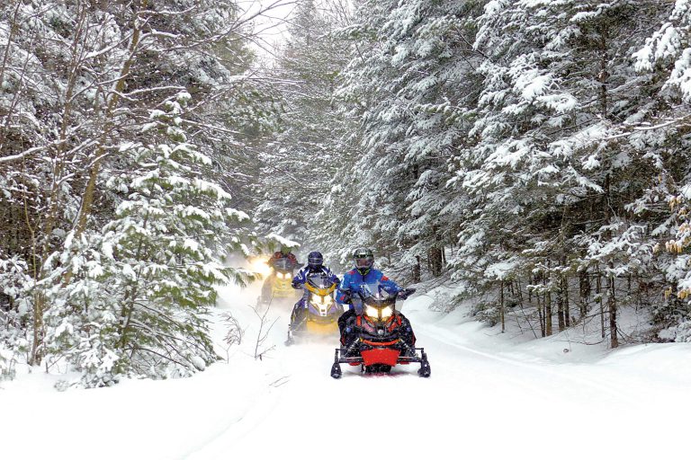 CROSS-BORDER SNOWMOBILE ADVENTURES CROSS-BORDER SNOWMOBILE ADVENTURES